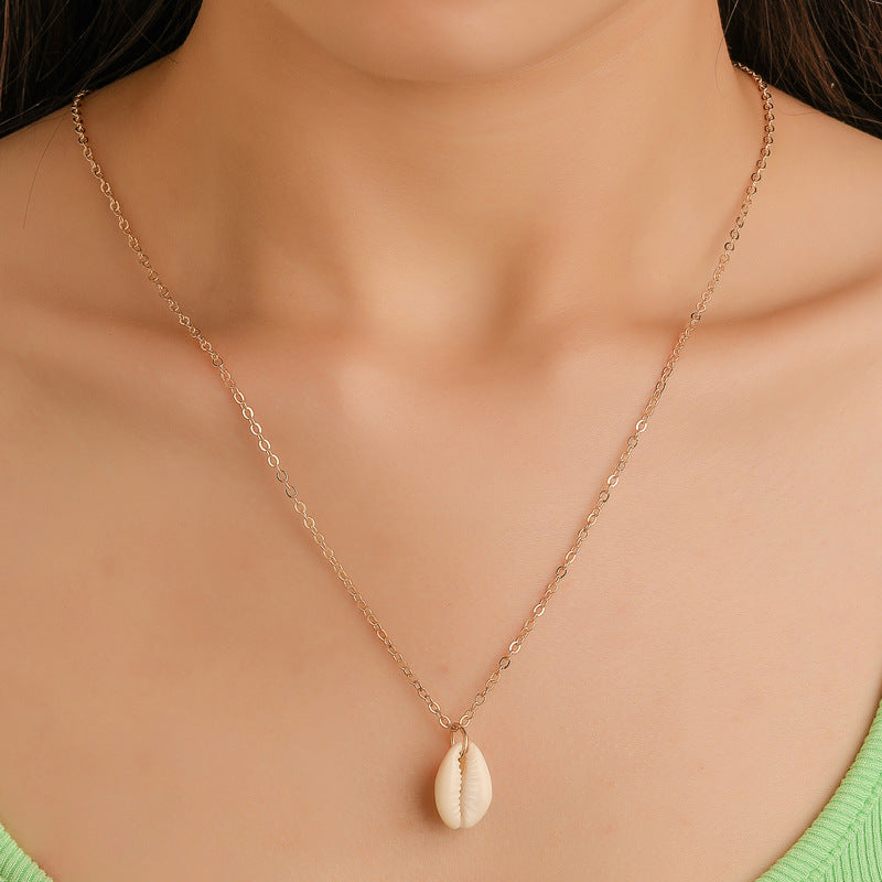 COWRIE SHELL PENDANT